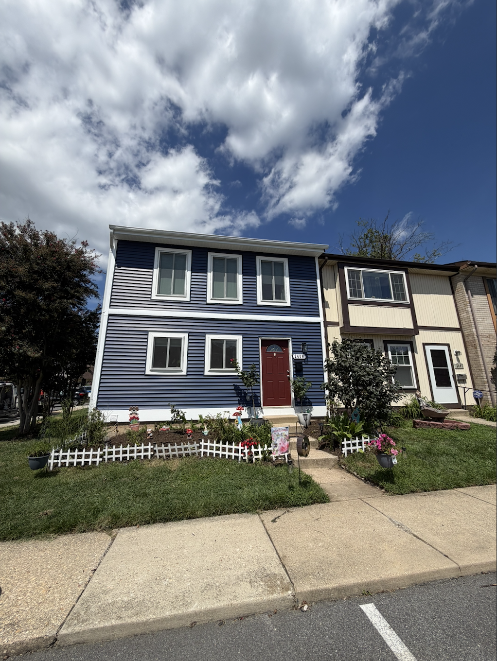 House exterior with blue siding and white trim